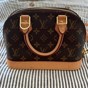 Authentic Luis Vuitton Alma BB handbag